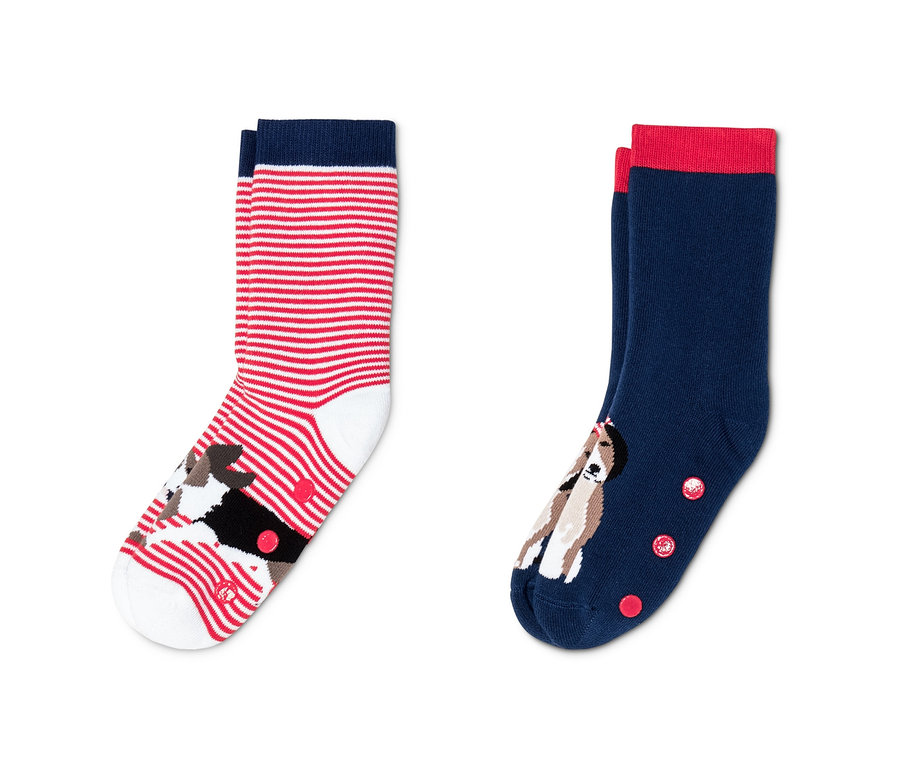 Dva páry protiskluzových ponožek s motivy psů.