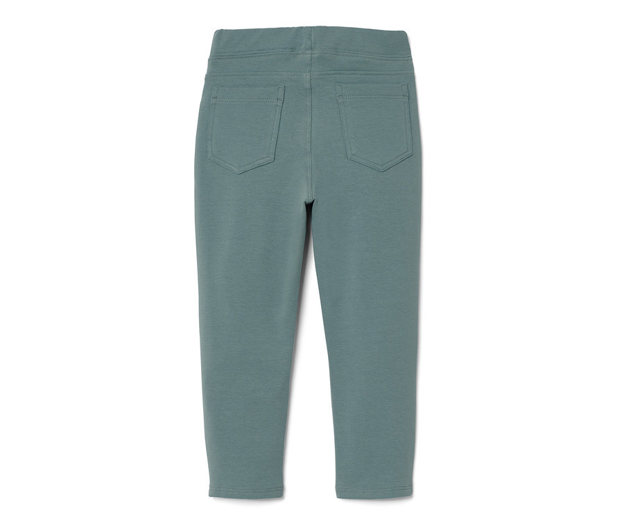 Modré dětské tregíny izolované na bílém pozadí.