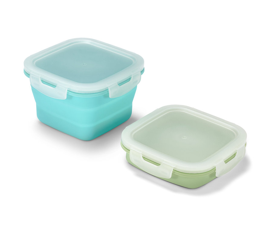 Dvě dózy na potraviny, jedna tyrkysová a jedna světle zelená.