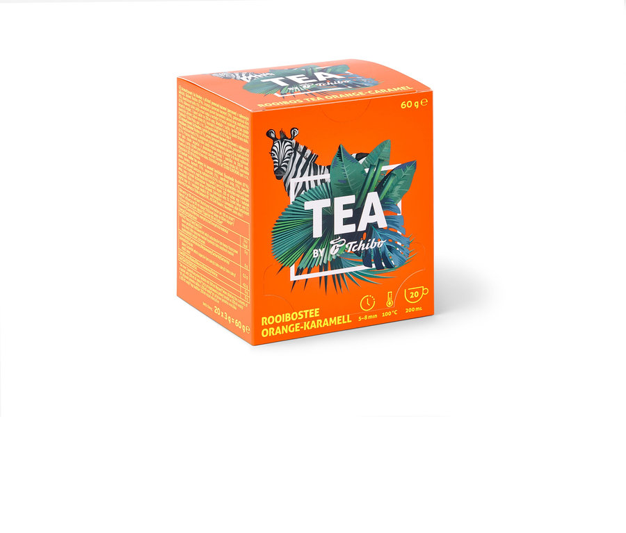 Oranžová krabička čaje Rooibos TEA by Tchibo s příchutí pomeranč/karamel – 8 × 20 nálevových sáčků.