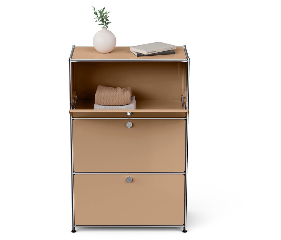 Otevřená béžová skříňka se dvěma zásuvkami, nahoře váza s rostlinou a knihy.