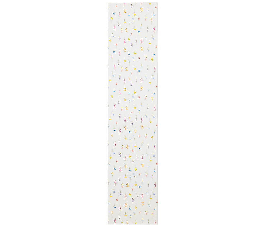Běhoun se vzorem květin ve žluté, modré, růžové a červené barvě na bílém pozadí.