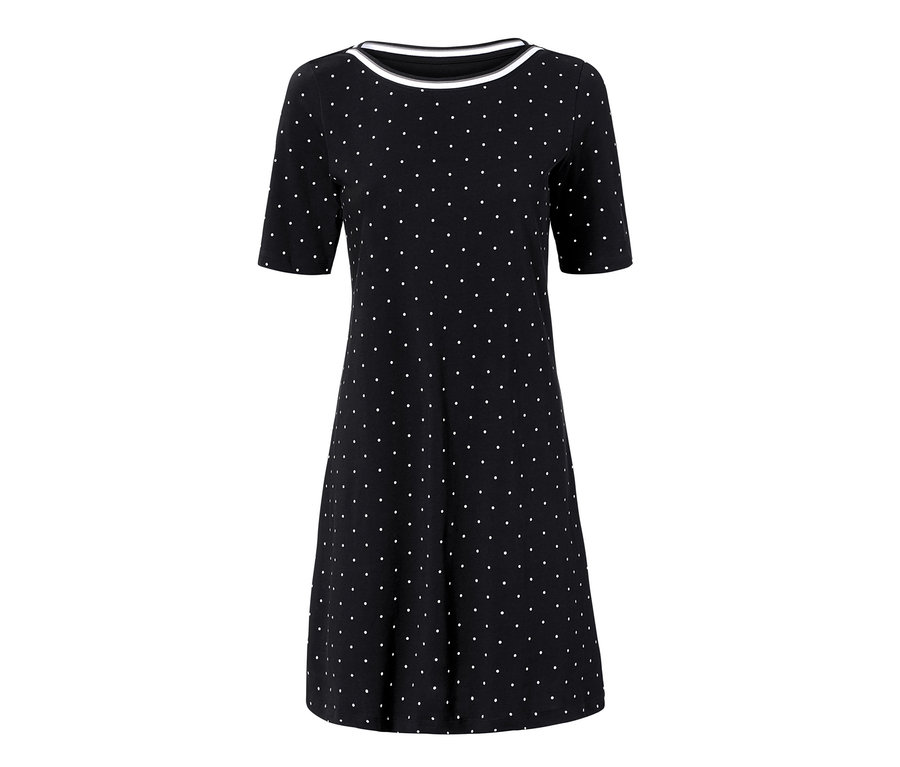 Černé žerzejové šaty s bílými puntíky.