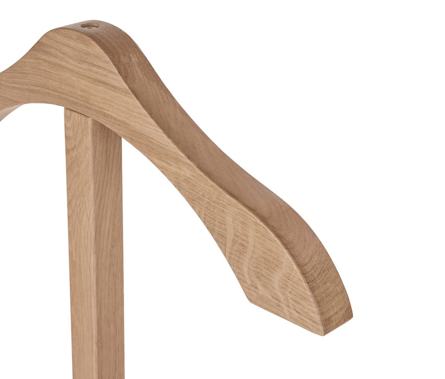 Detail dřevěného němého sluhy.