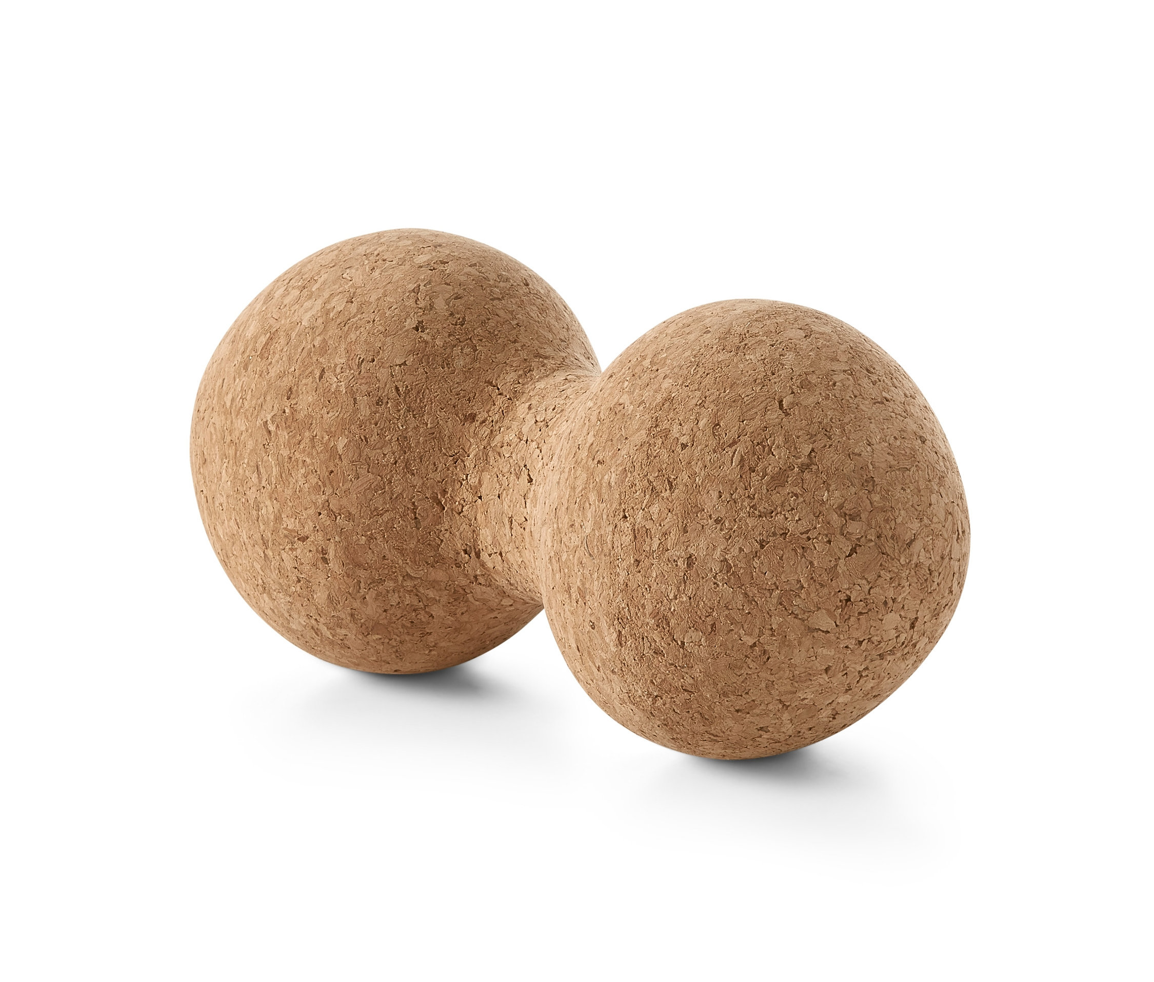 Dvojitý masážní míček z korku na bílém pozadí.