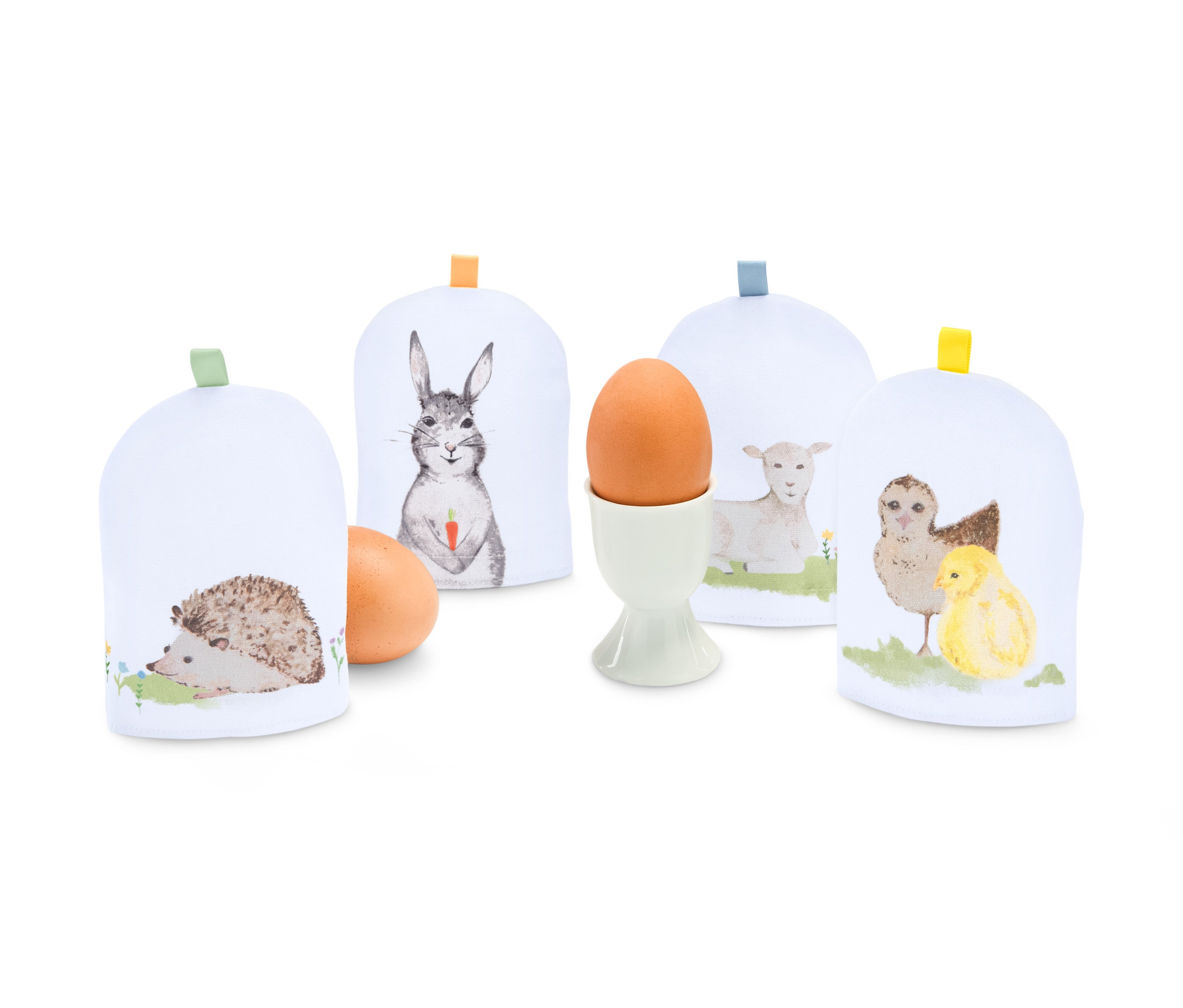 Sada 4 ohřívačů na vajíčka s motivem zvířat.