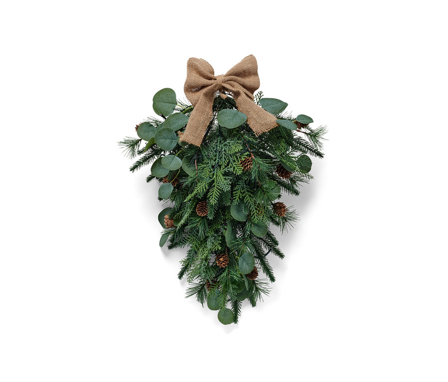 Zelená LED dekorace na dveře s hnědou mašlí a šiškami.