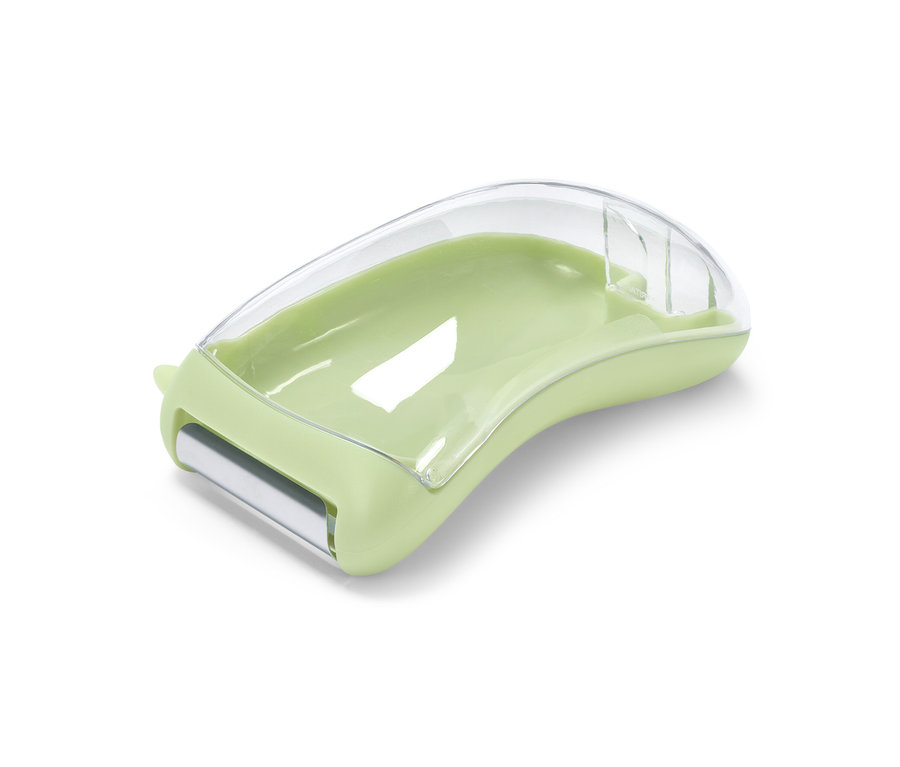 Univerzální škrabka se záchytnou nádobkou světle zelené barvy s průhledným plastovým krytem.