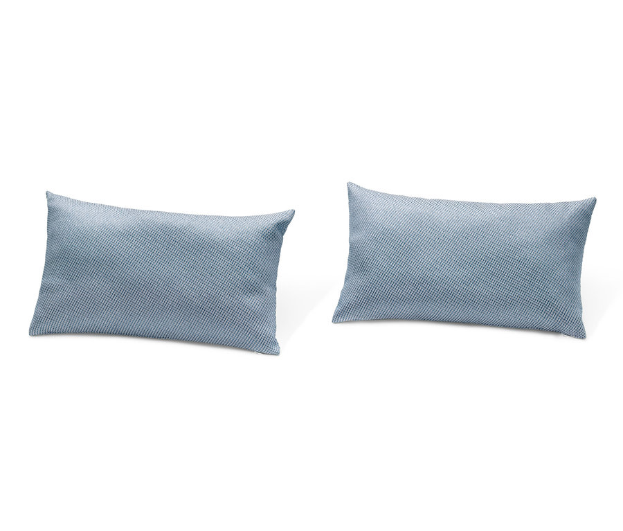 Dva venkovní polštáře s tkanou strukturou.
