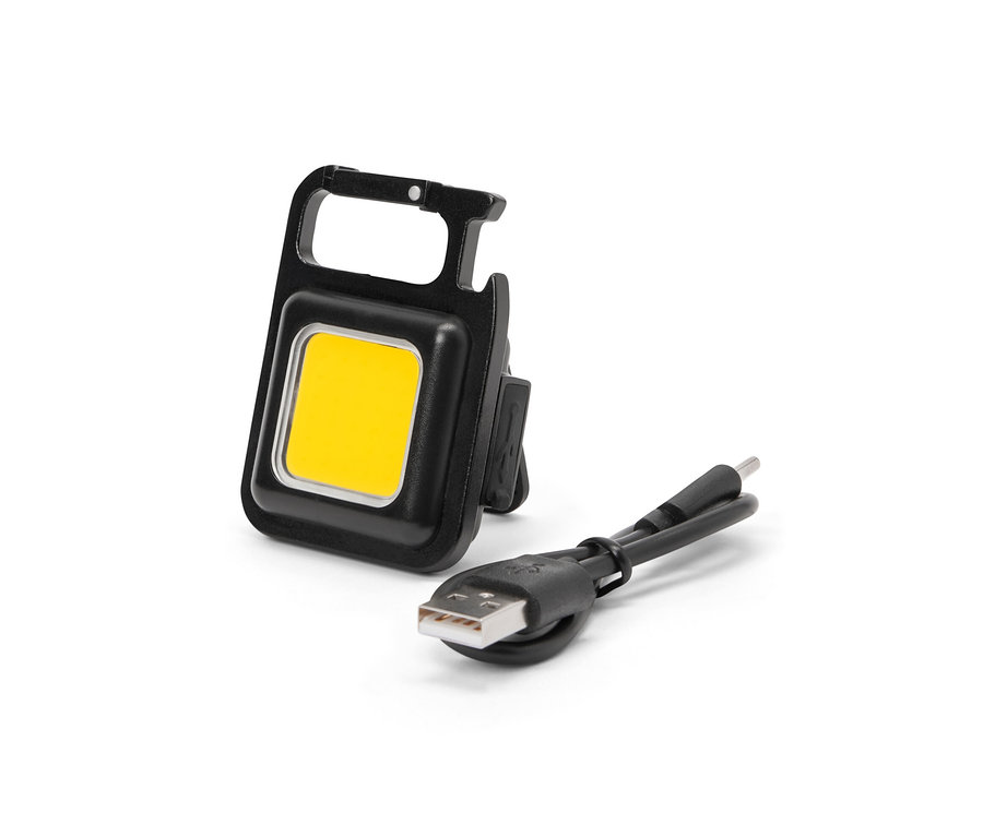 Černé multifunkční světlo s nabíjecím kabelem.