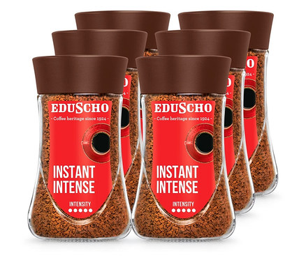 Šest balení instantní kávy EDU Instant Intense 200 g v průhledných sklenicích s hnědým víčkem.