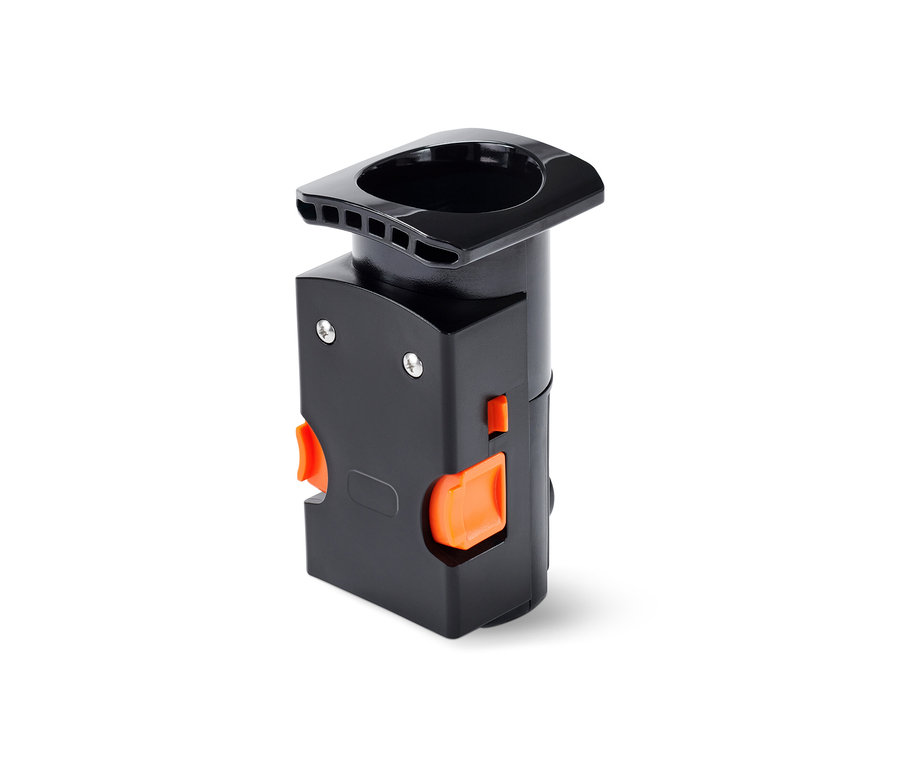 Černá spařovací jednotka pro plnoautomatické kávovary Tchibo s oranžovými detaily.