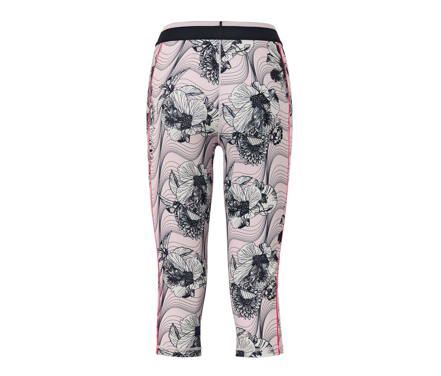 Detail dámských 3/4 sportovních legín s květinovým vzorem.