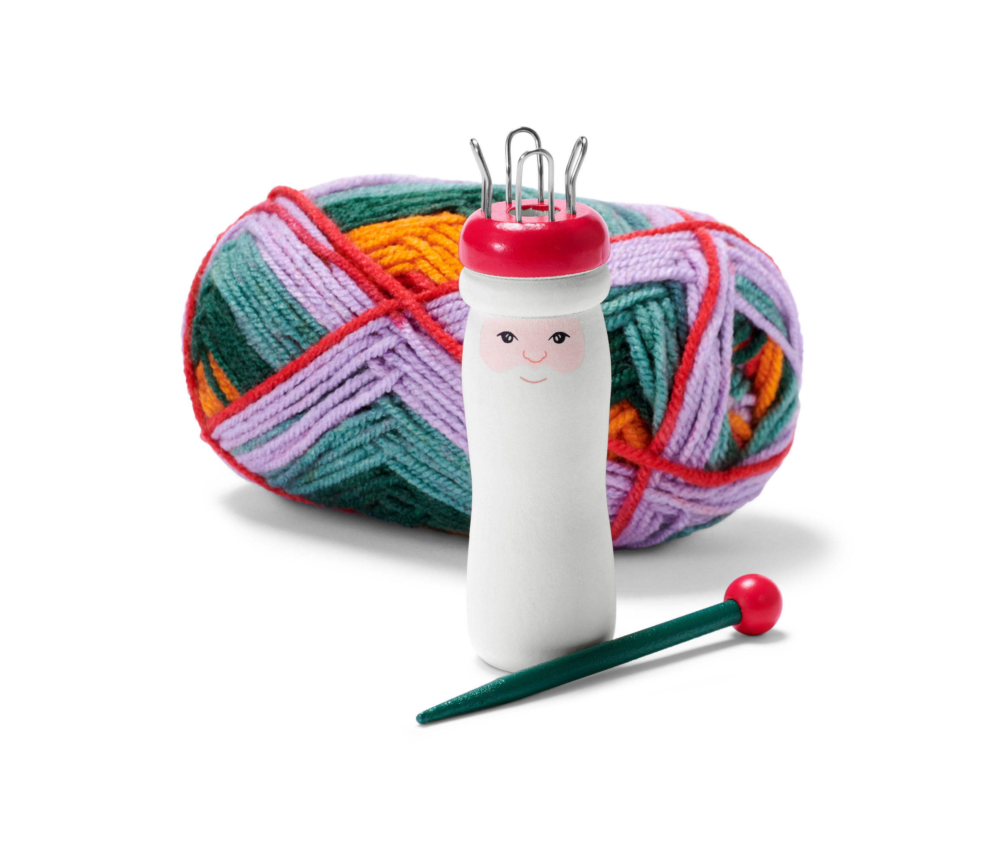 Sada na pletení dutinek »Santa« s klubkem barevné příze a zelenou jehlou.