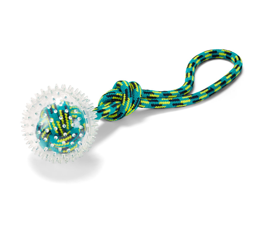 Házecí hračka pro psy s průhlednou koulí a modrozelenou provázkovou rukojetí.