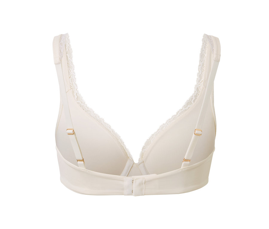 Detail krémové podprsenky s kosticemi, zadní pohled.