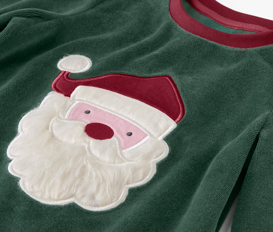 Zelený vánoční svetr s aplikací Santa Clause.