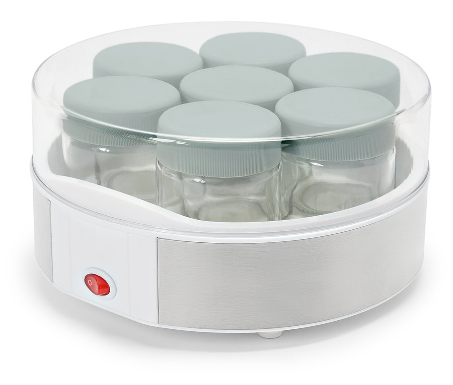 Ohřívač dětské výživy s několika sklenicemi uvnitř.