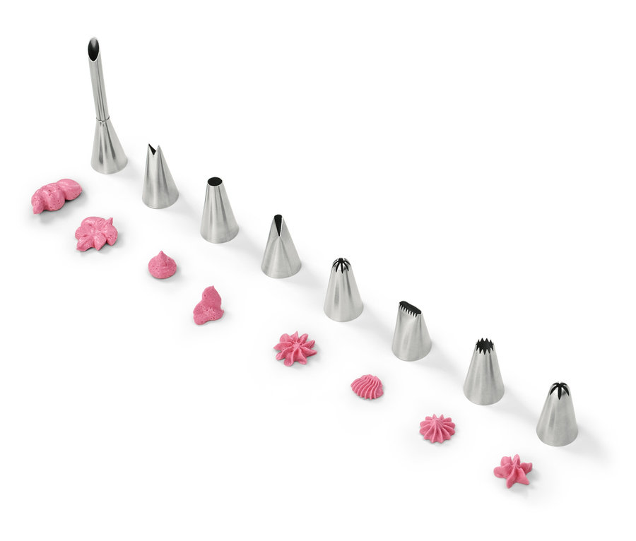 Dekorativní špičky s růžovou polevou na bílém pozadí.