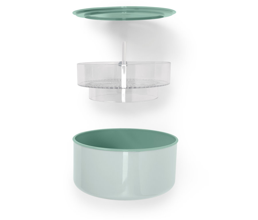 Rozložený pohled na nádobu na uchovávání potravin se zeleným víkem, průhlednou vložkou a světle zelenou nádobou.