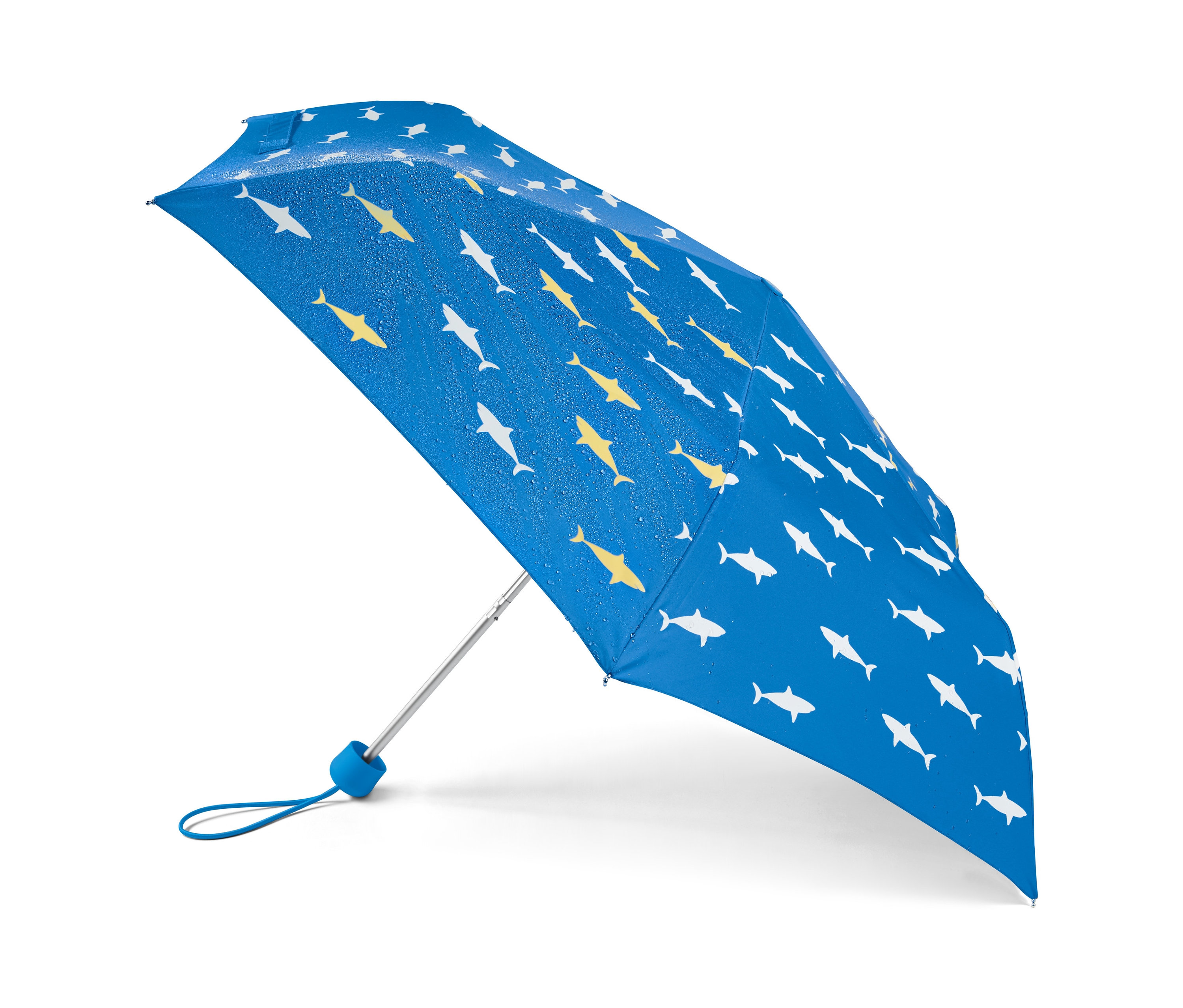 Modrý dětský skládací deštník s měnící se barvou a se vzorem žlutých a bílých žraloků.