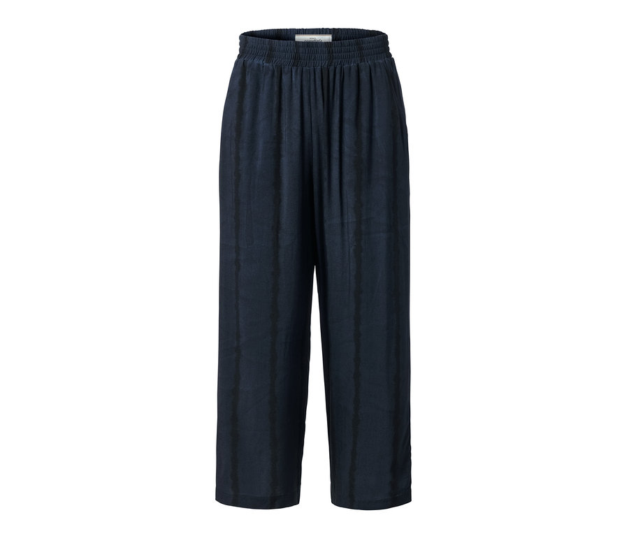 Tmavě modré culotte kalhoty s potiskem.