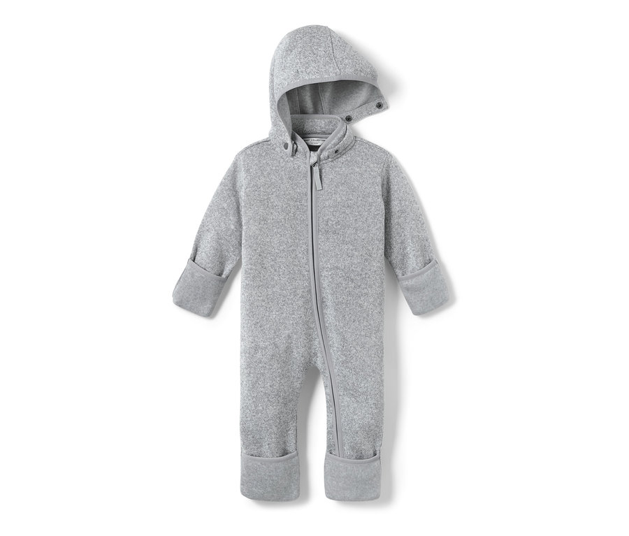 Šedý dětský overal z pleteného fleecu s kapucí a zipem.