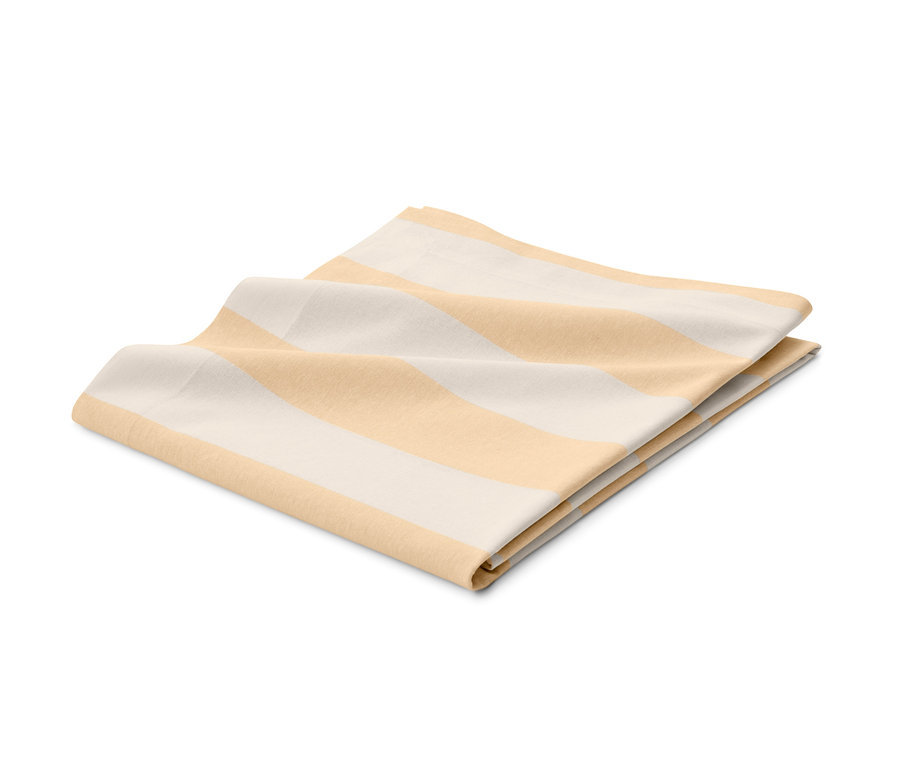 Složený ubrus se žlutými a bílými pruhy.
