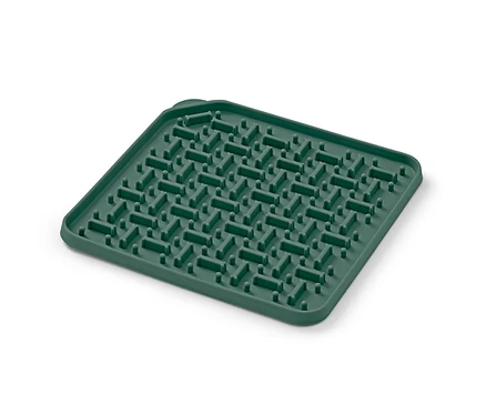 Zelená lízací podložka.