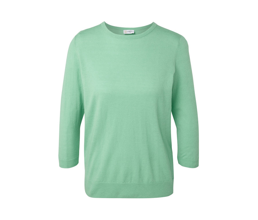 Svetr z jemného úpletu s hedvábím světle zelené barvy.