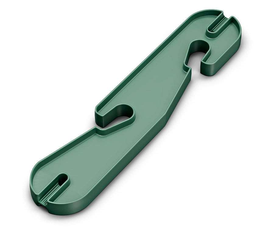 Zelený plastový držák kabelu s otvory.