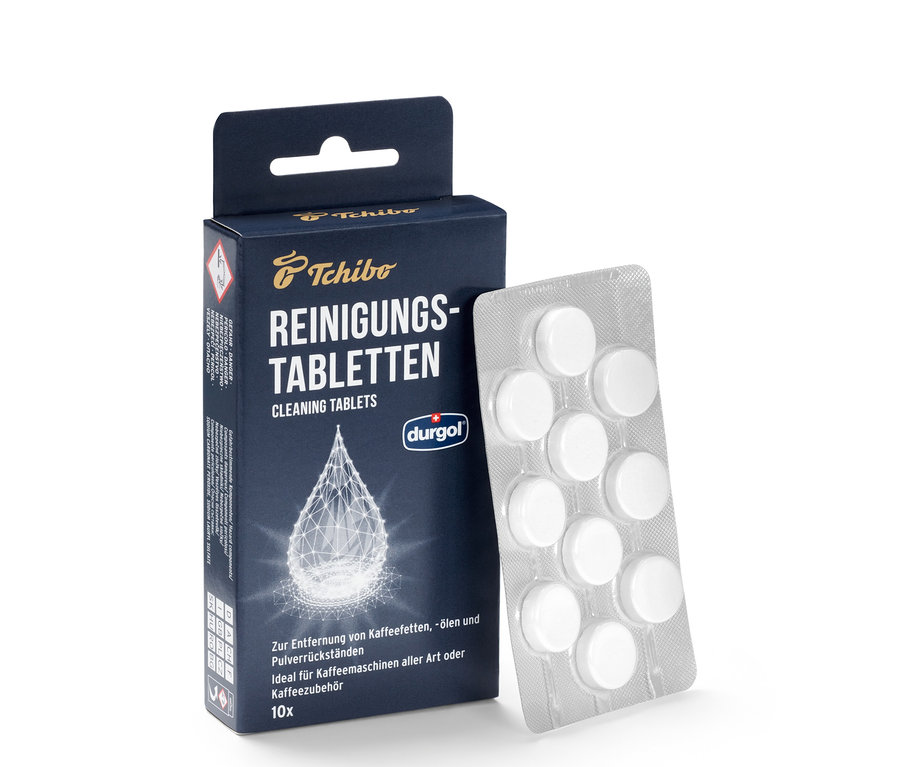 Balení čisticích tablet durgol® k odstranění kávových tuků a blistr s tabletami.