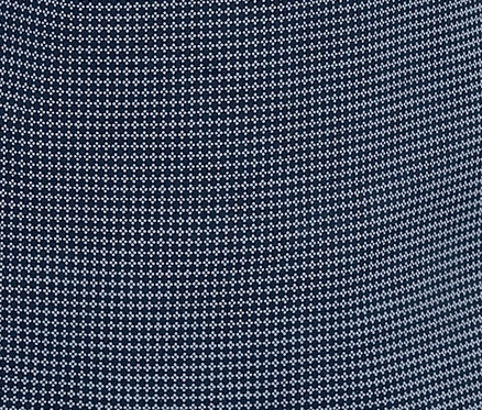 Detailní záběr na krátké pyžamo s drobným vzorem.