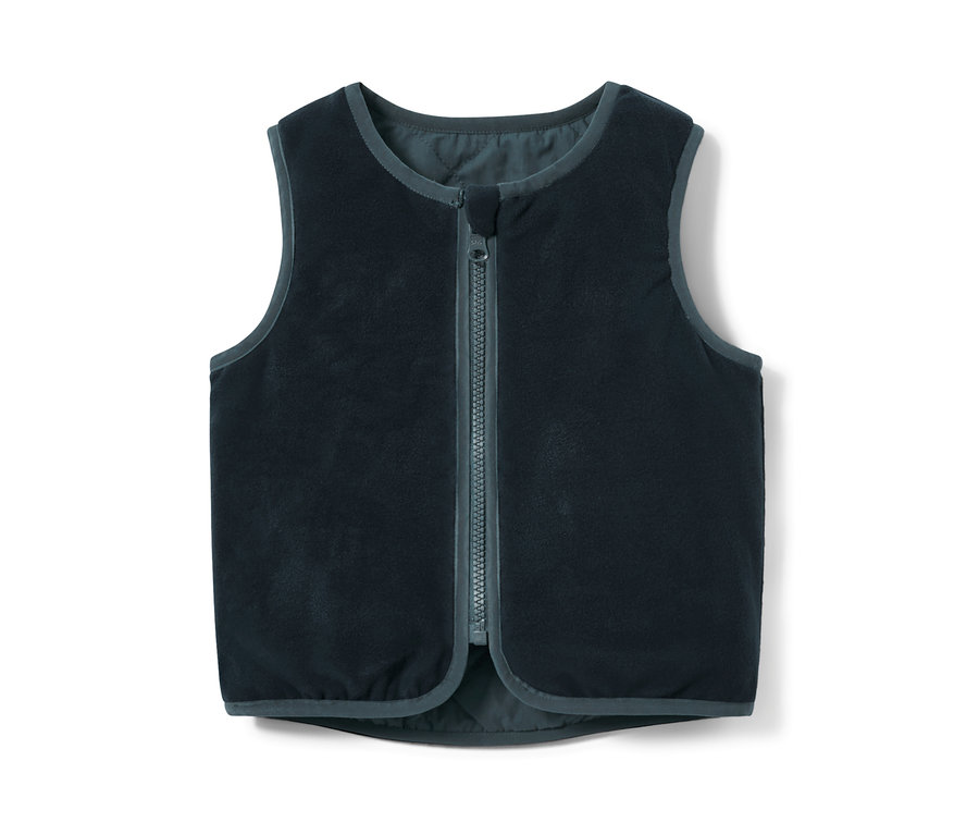 Tmavě modrá dětská oboustranná prošívaná vesta se zipem uprostřed.