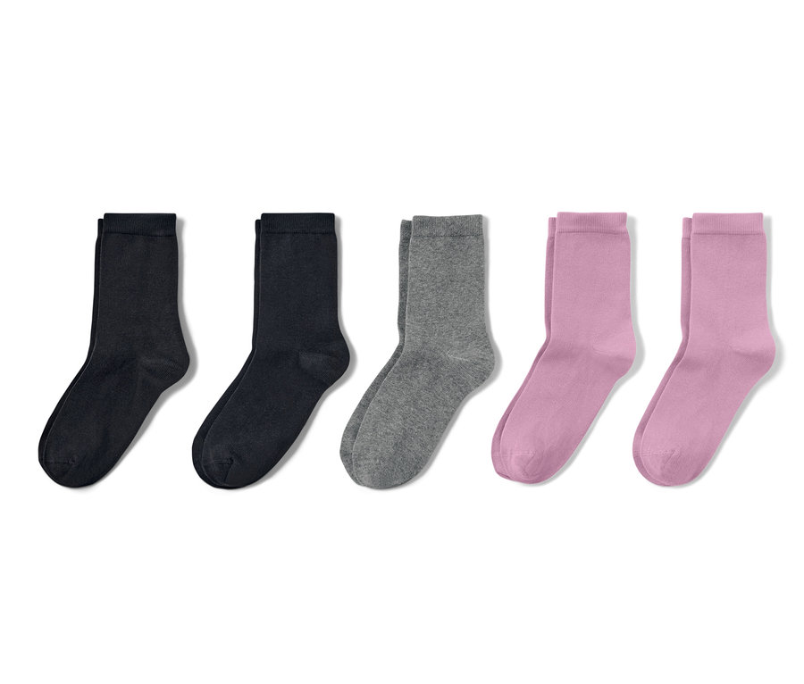 Pět párů dětských ponožek pastelově fialové a černé barvy.
