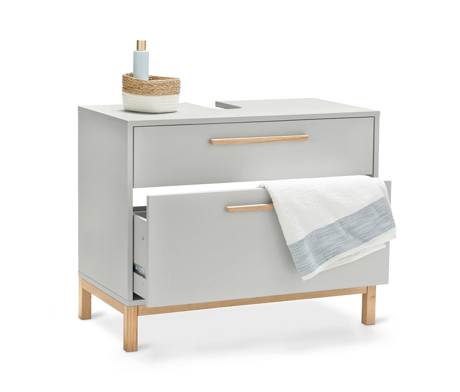 Světle šedá koupelnová skříňka pod umyvadlo »Eklund« se 2 zásuvkami, jedna zásuvka je otevřená a je na ní ručník.