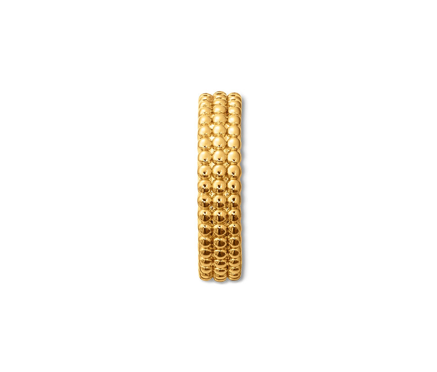 Detail zlaté náušnice Earcuff s perlovou strukturou.