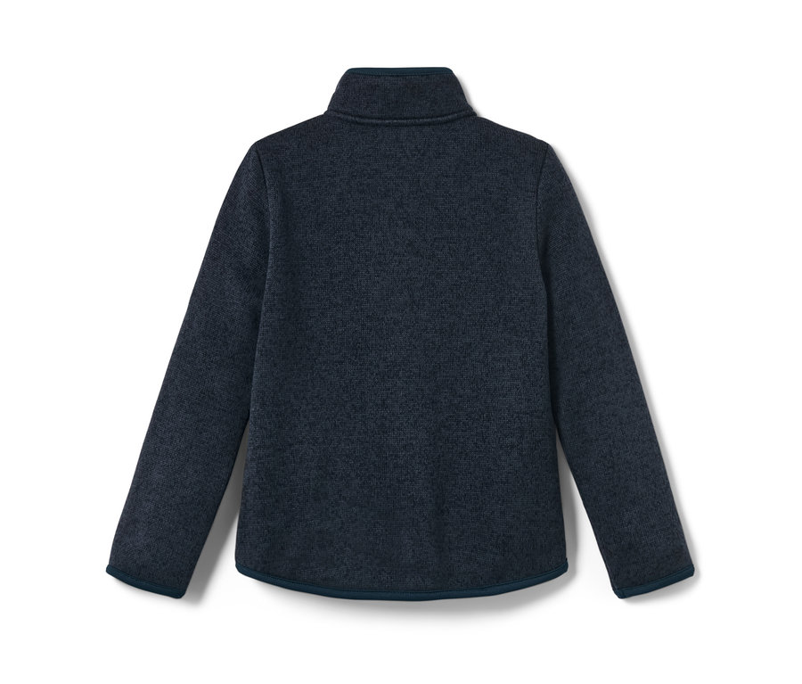 Detail dětské mikiny z pleteného fleecu.
