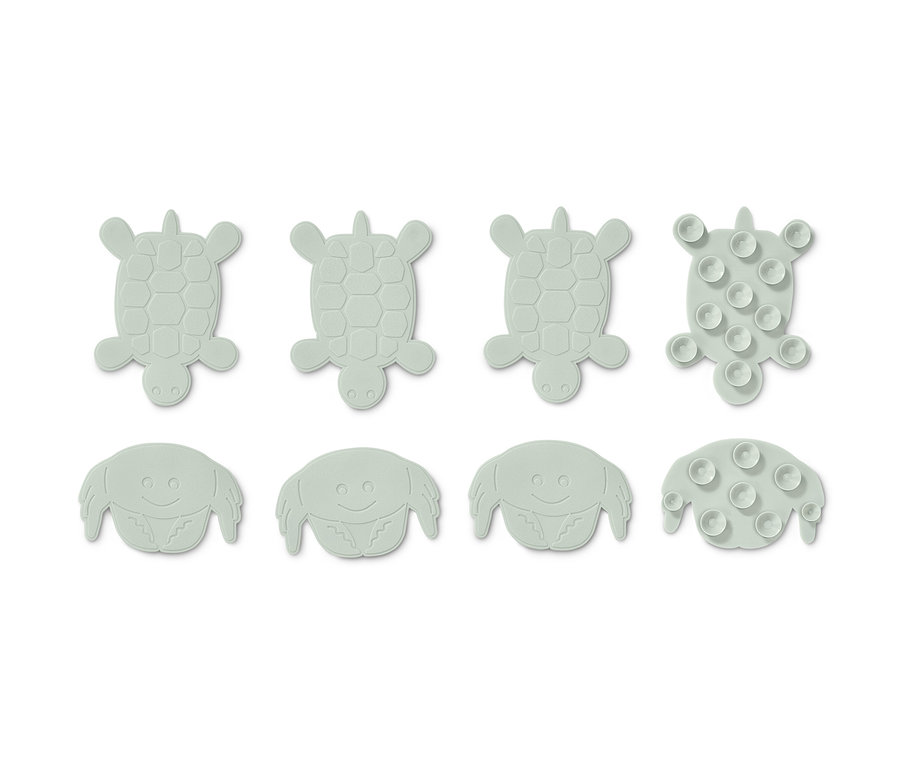 Osm protiskluzových podložek ve tvaru želv a krabů.