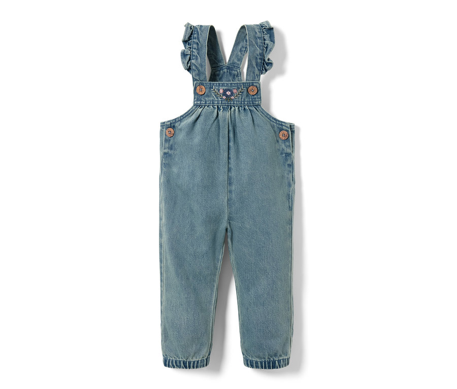 Džínové kalhoty s laclem s květinovou výšivkou na náprsence a volánovými ramínky.