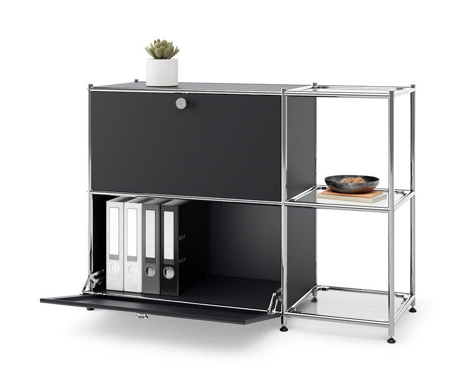 Černá kovová odkládací skříňka »CN3« se 2 výklopnými dvířky, s rostlinou nahoře a pořadači uvnitř.