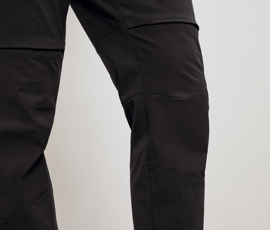 Detail of black pants.