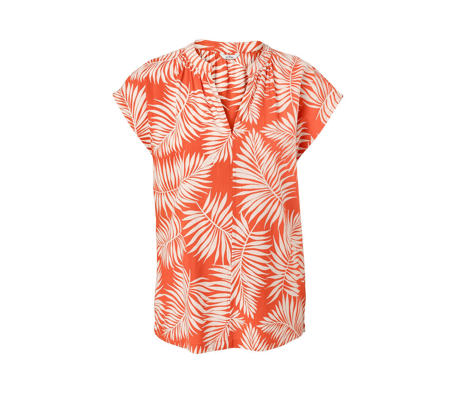 Oranžová halenka s krátkým rukávem a potiskem listů.