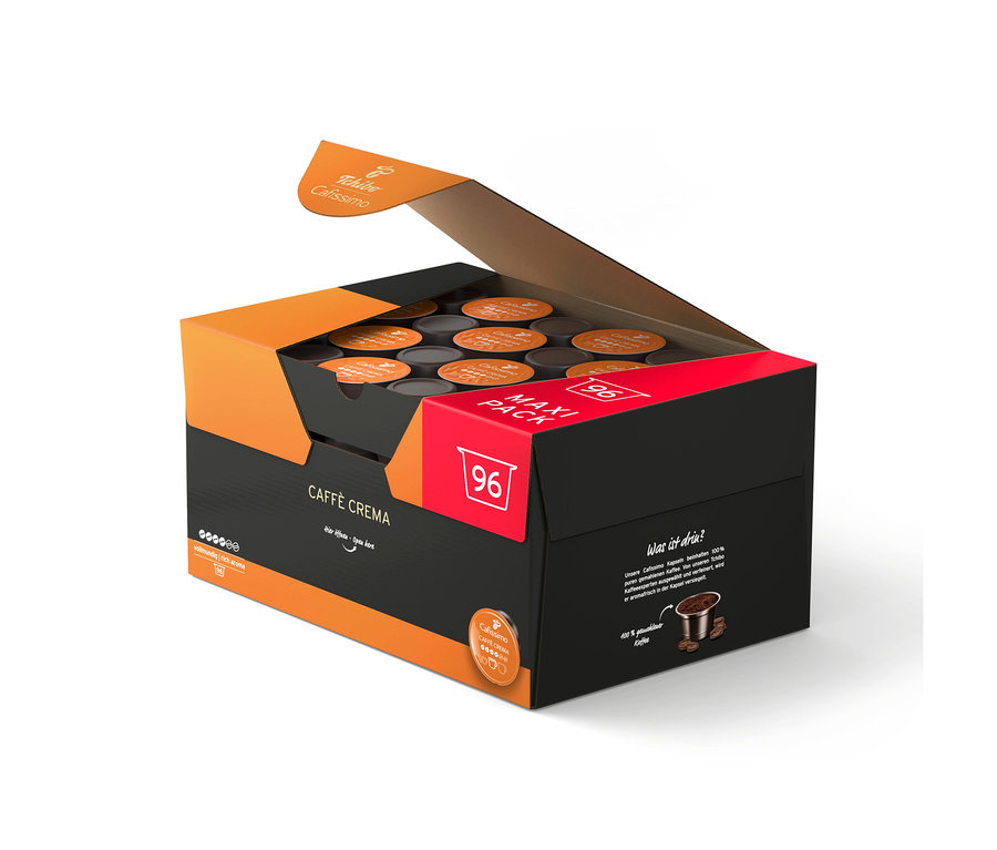 Otevřená černá a oranžová krabice s 96 kávovými kapslemi Tchibo Cafissimo Caffè Crema.