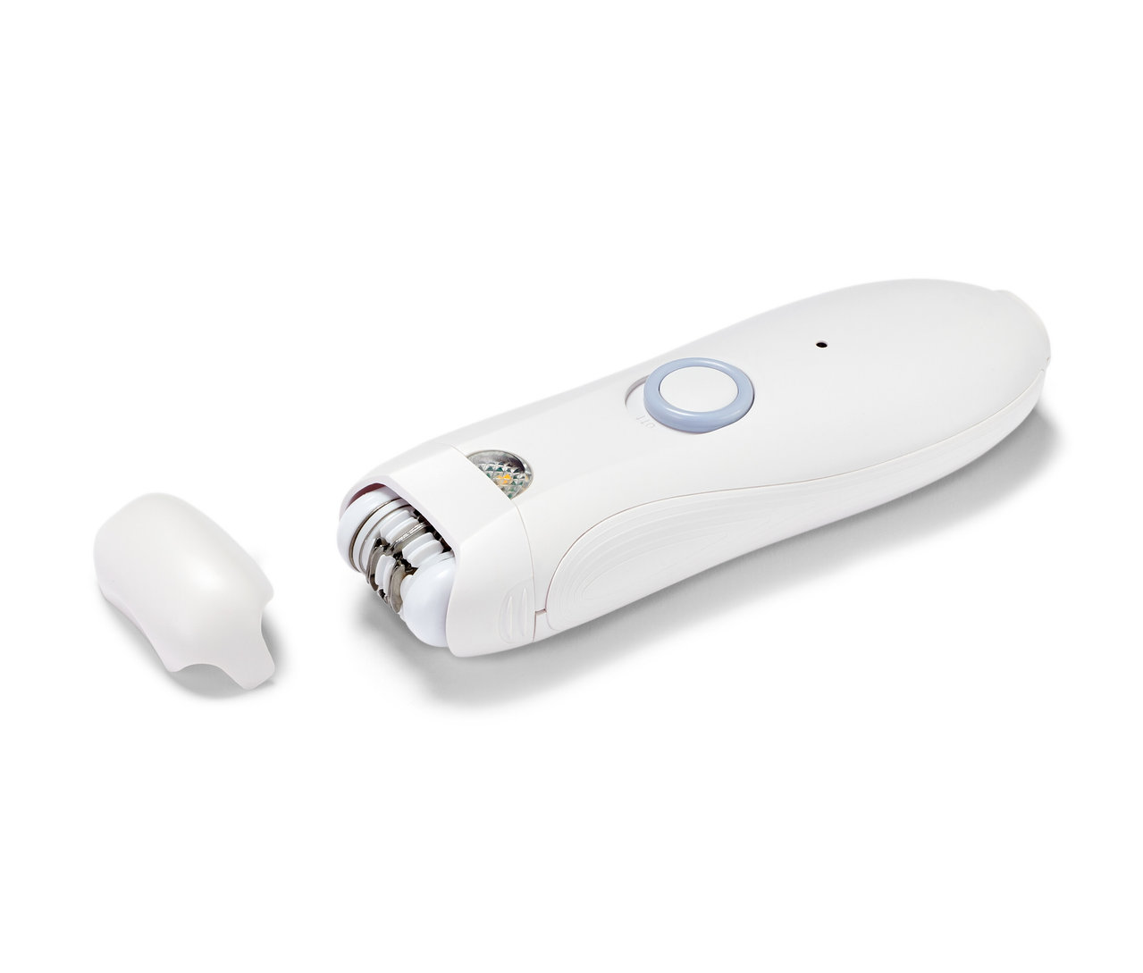 Detailní záběr bílého epilátoru na obličej s odnímatelným nástavcem.