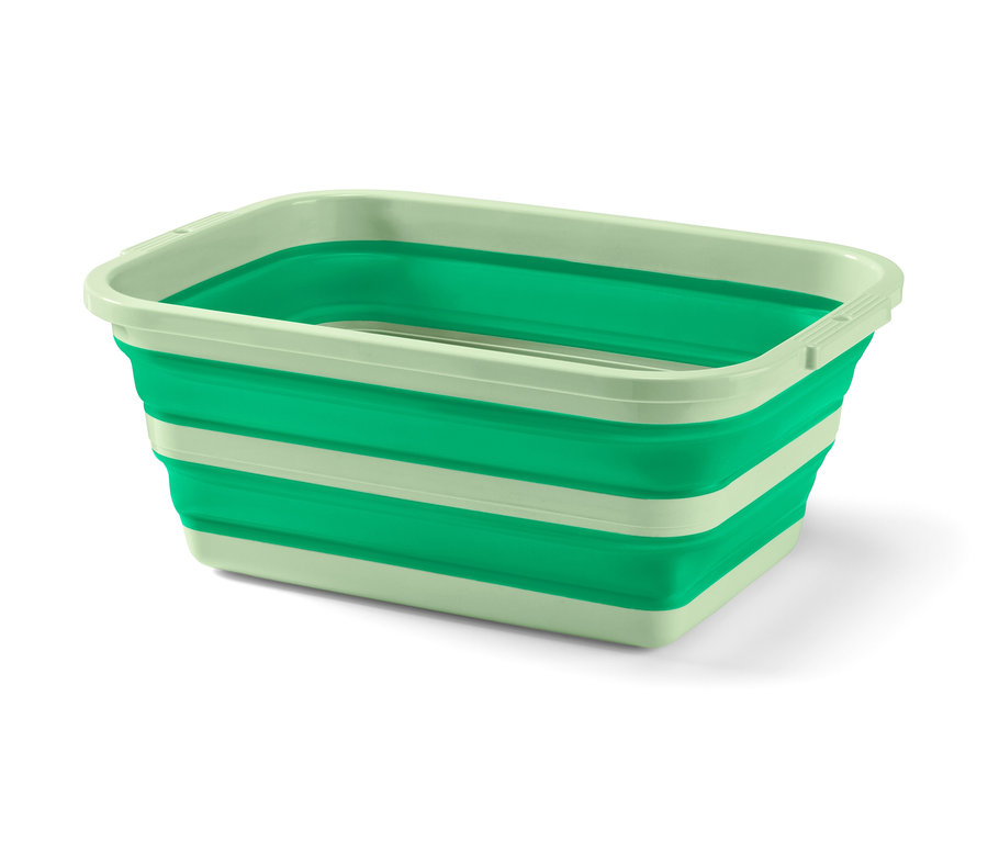 Zelený skládací koš na prádlo a nádobí.