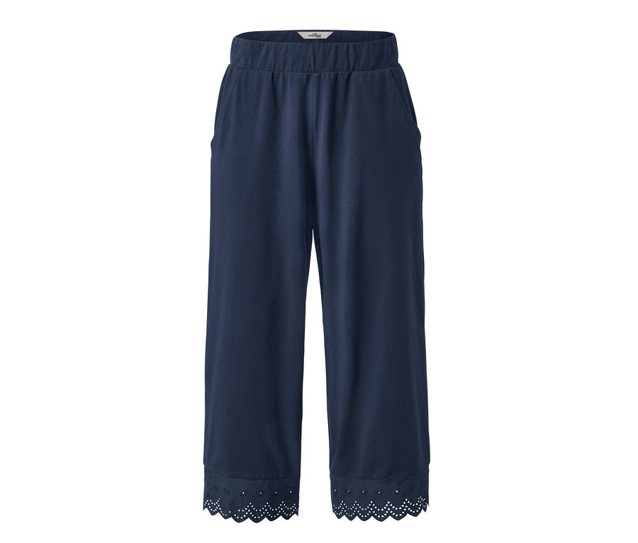 Tmavě modré culottes kalhoty s výšivkou na lemu.