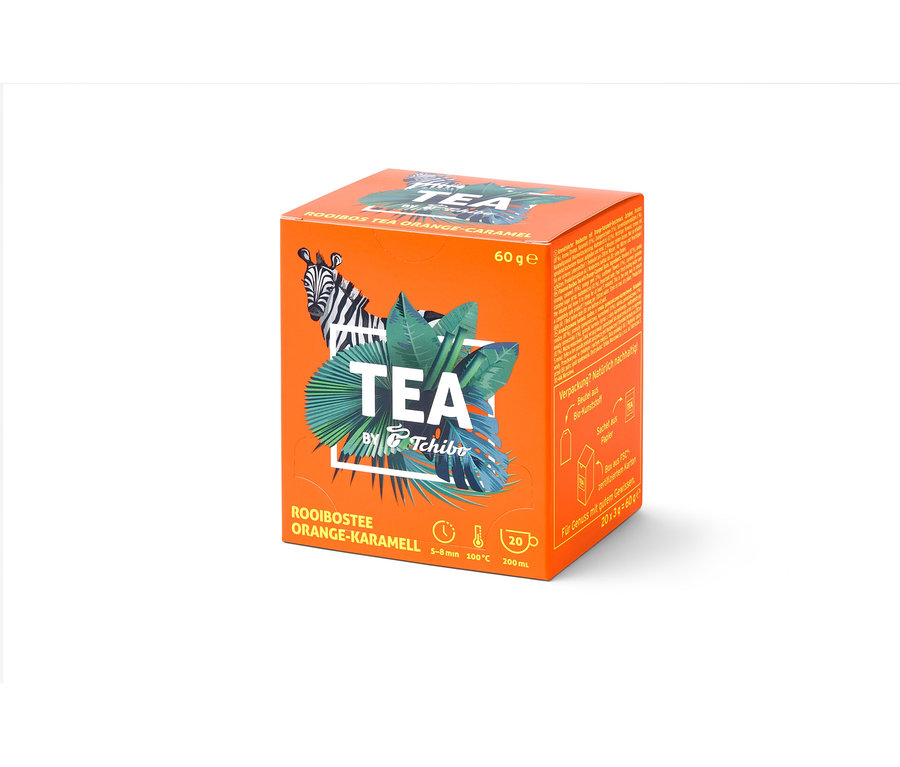 Oranžová krabička čaje Rooibos TEA by Tchibo s příchutí pomeranč/karamel – 8 × 20 nálevových sáčků.