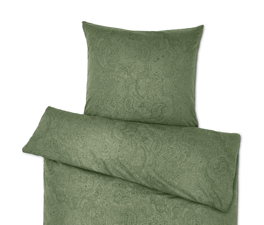 Zelené povlečení s paisley vzorem.