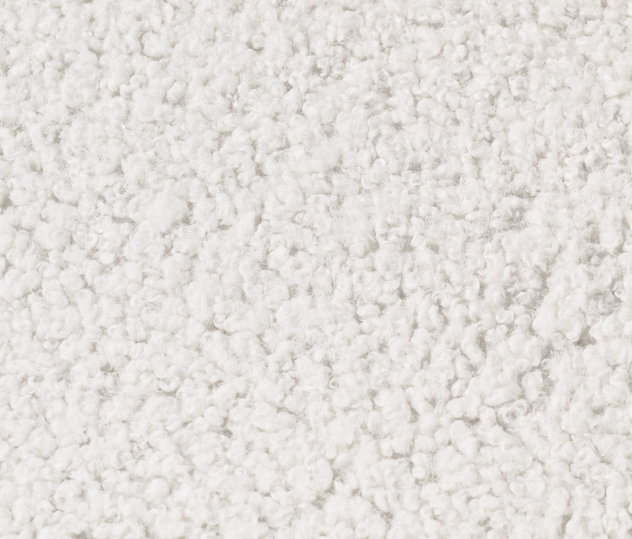 Detailní záběr na texturu otočného křesla.